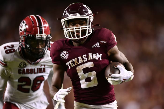 Oct 23, 2021; College Station, Texas, USA; Texas A&M Aggies running back Devon Achane (6) runs the ball in for a touchdown during the third quarter against the South Carolina Gamecocks at Kyle Field. Mandatory Credit: Maria Lysaker-USA TODAY Sports